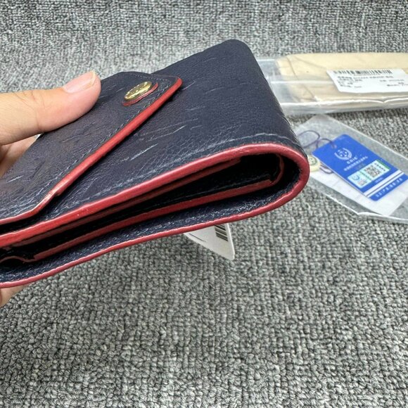Authentic Louis Vuitton Victorine Navy Monogram Leather Wallet - Picture 5 of 15